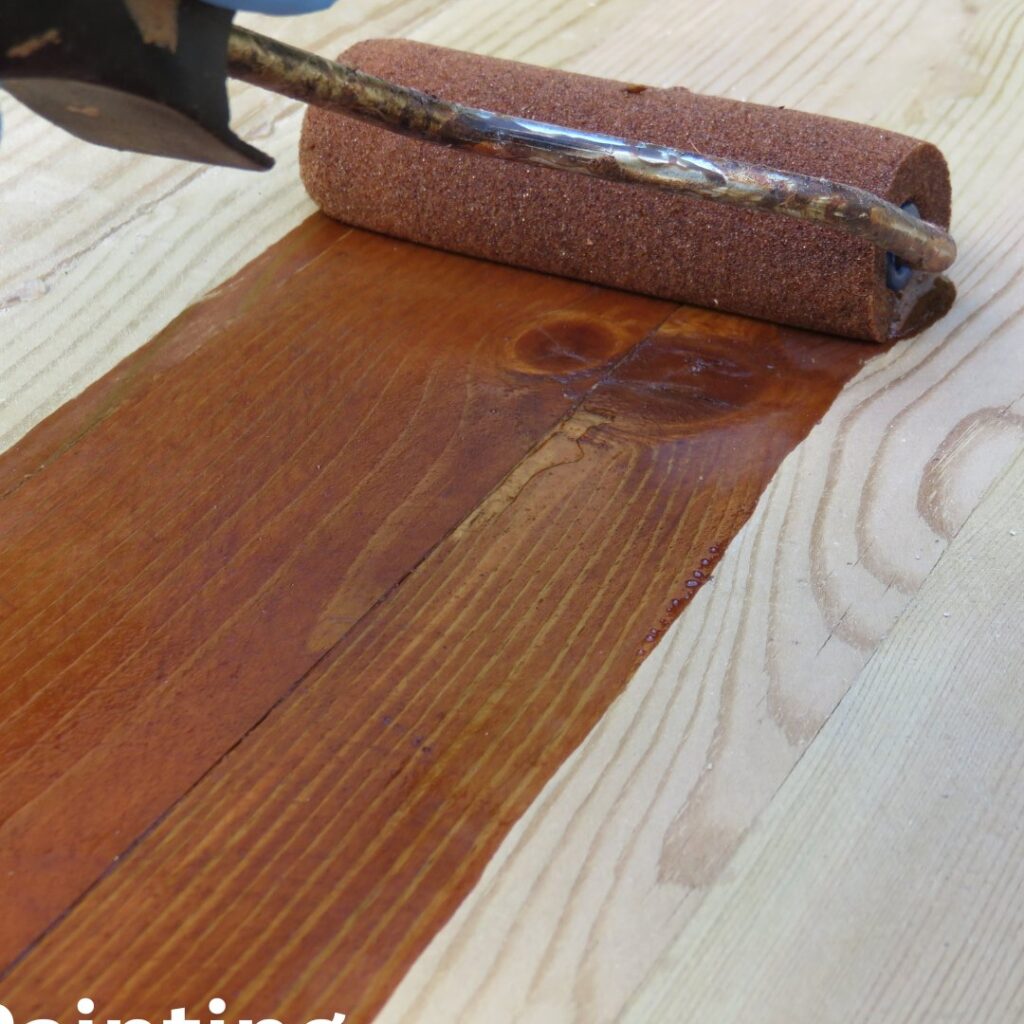 knockout painting staining a deck