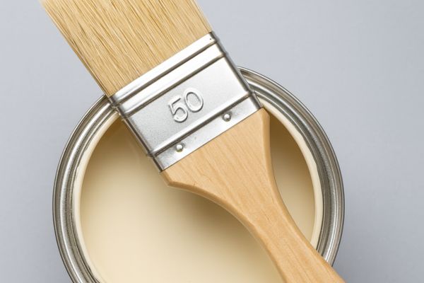 Paint in can with paint brush