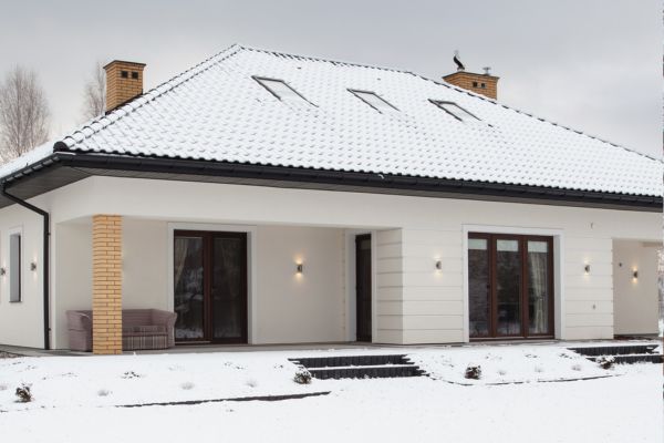 Painted house during winter season by knockout Painting Services